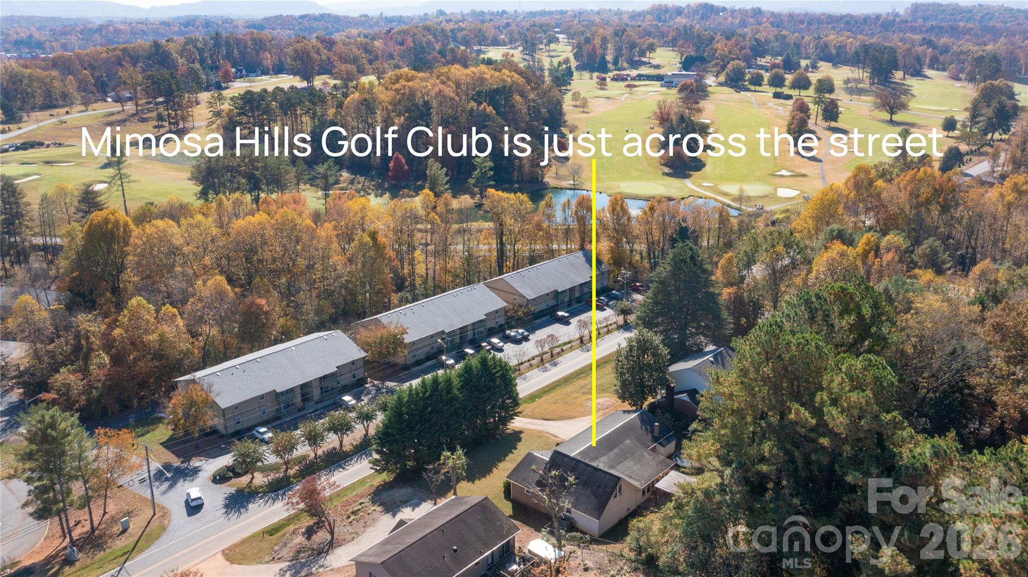 324 Golf Course Road Morganton, NC 28655 - Photo 3 of 21 an aerial view of residential houses with outdoor space