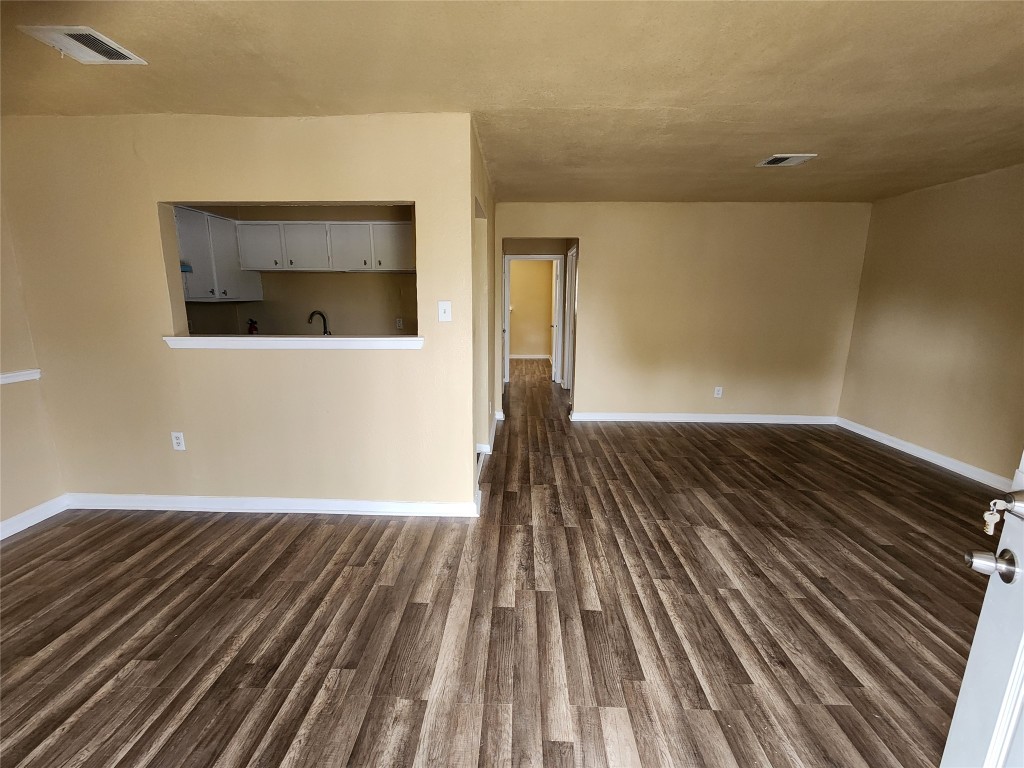 4311 Yellowstone Boulevard, Unit 5 Houston, TX 77021 - Photo 3 of 8 a view of empty room with wooden floor
