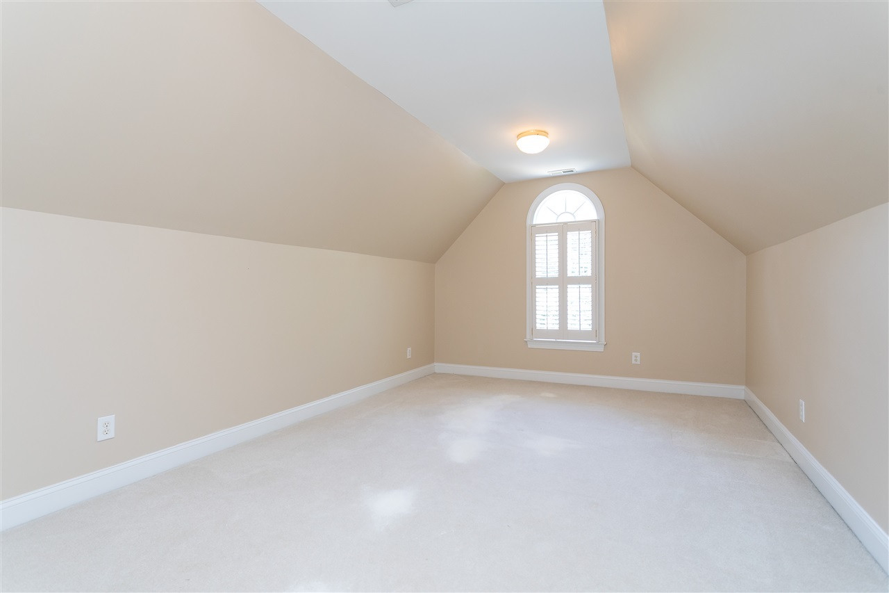 1904 Capers Court Raleigh, NC 27612 - Photo 21 of 29 17 X 12 bonus room with cathedral ceiling and window. walk in storage Bonus Room