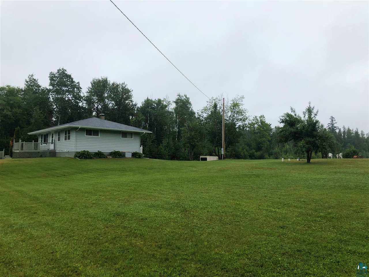 2010 Moorhead Road Cloquet, MN 55720 - Photo 20 of 24 At the edge of property where one can drive up the easement to the 5 acre parcel included (has pond)