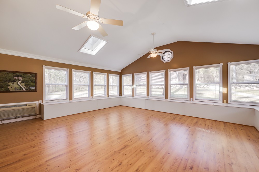2551 Academy Road Lebanon, TN 37087 - Photo 13 of 45 a view of an empty room with a window and wooden floor
