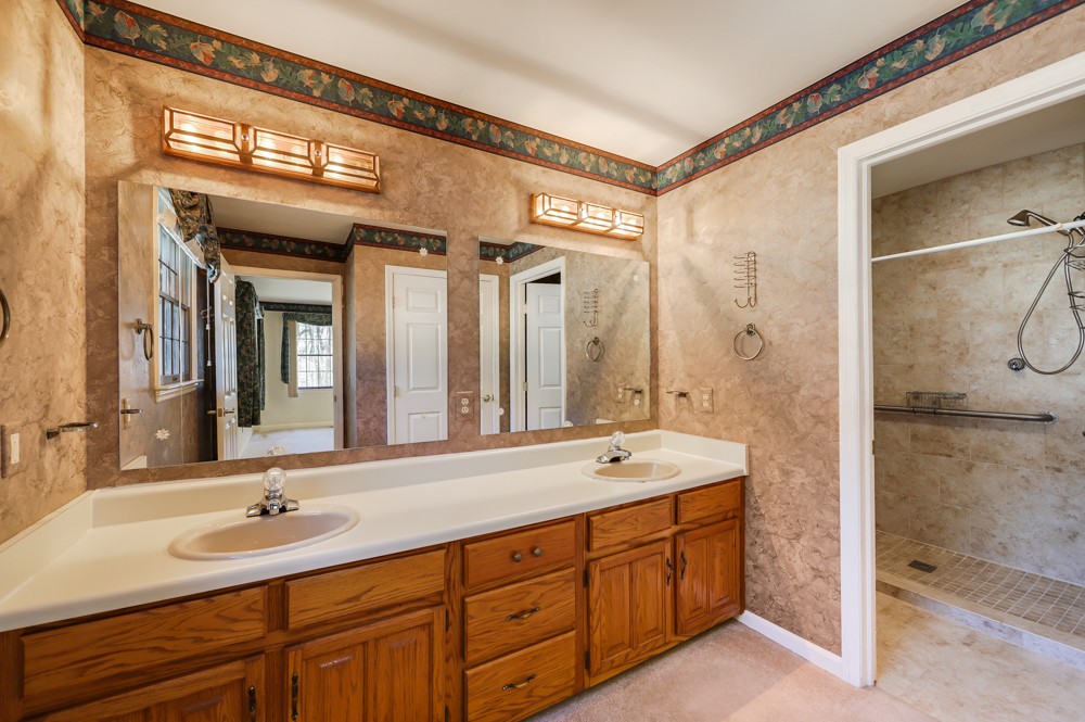 2551 Academy Road Lebanon, TN 37087 - Photo 18 of 45 a bathroom with a sink and a mirror