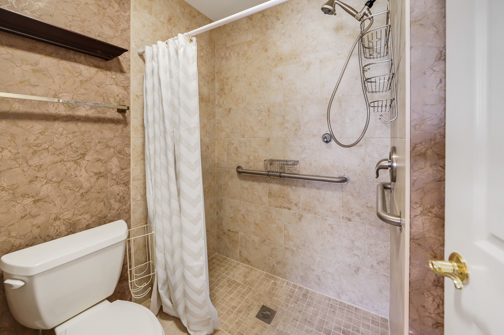 2551 Academy Road Lebanon, TN 37087 - Photo 19 of 45 a bathroom with a shower toilet and sink