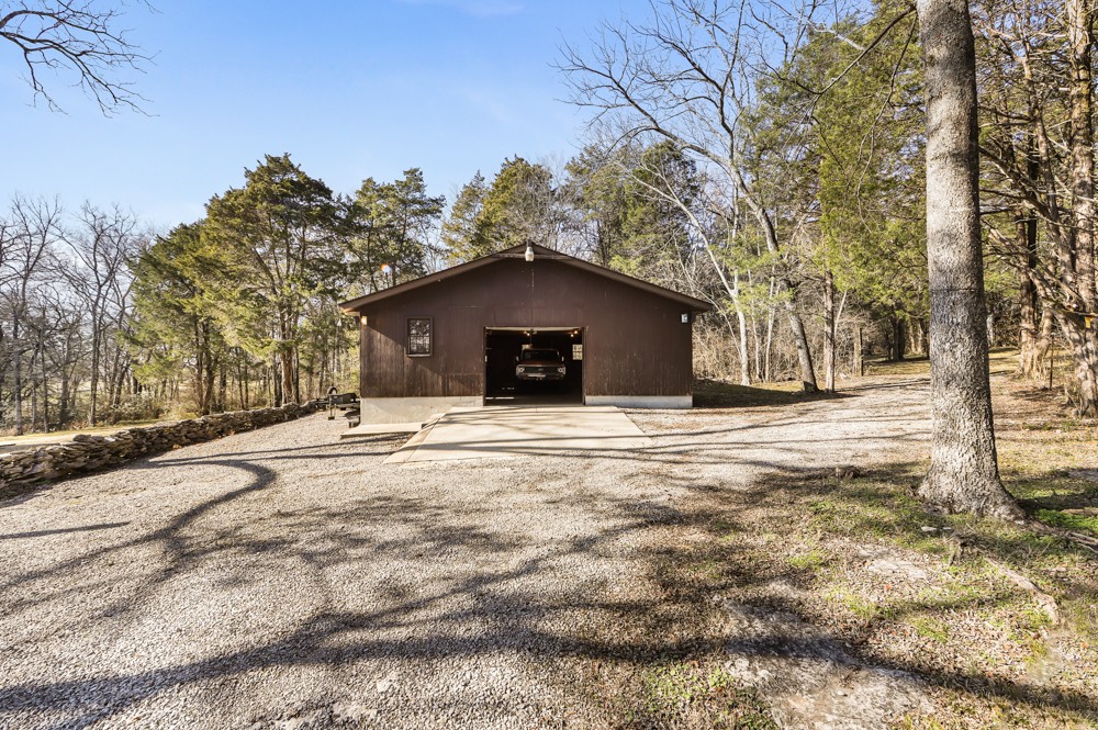 2551 Academy Road Lebanon, TN 37087 - Photo 28 of 45 a house with trees in the background