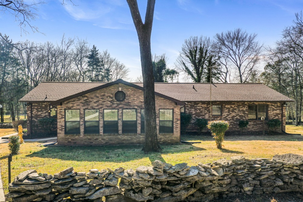 2551 Academy Road Lebanon, TN 37087 - Photo 29 of 45 a front view of a house with garden