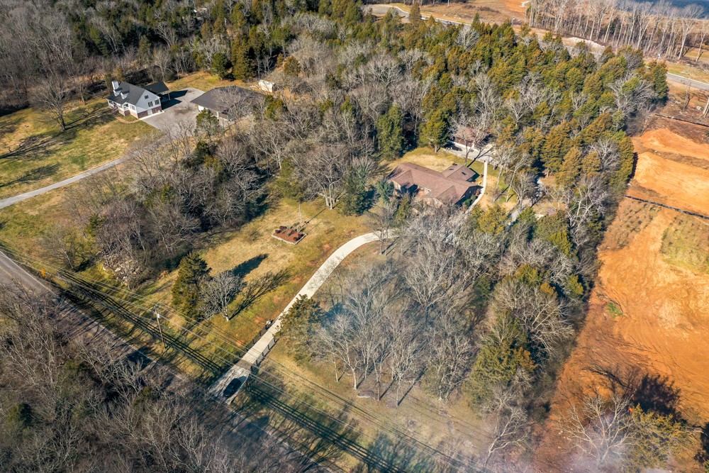 2551 Academy Road Lebanon, TN 37087 - Photo 42 of 45 a view of a yard with plants and large trees