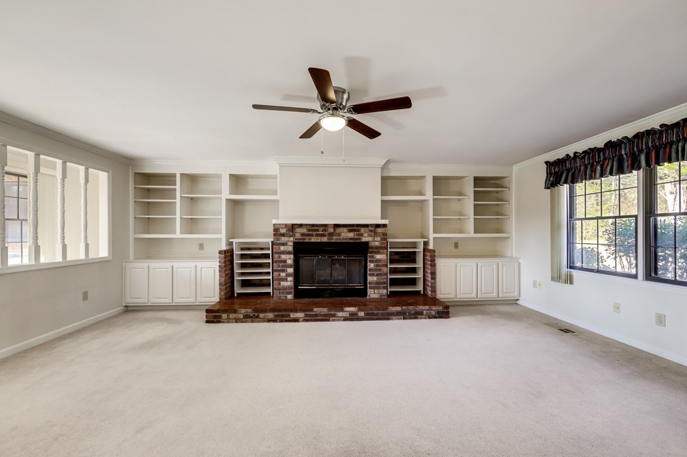 2551 Academy Road Lebanon, TN 37087 - Photo 10 of 45 a living room with fireplace furniture and a large window