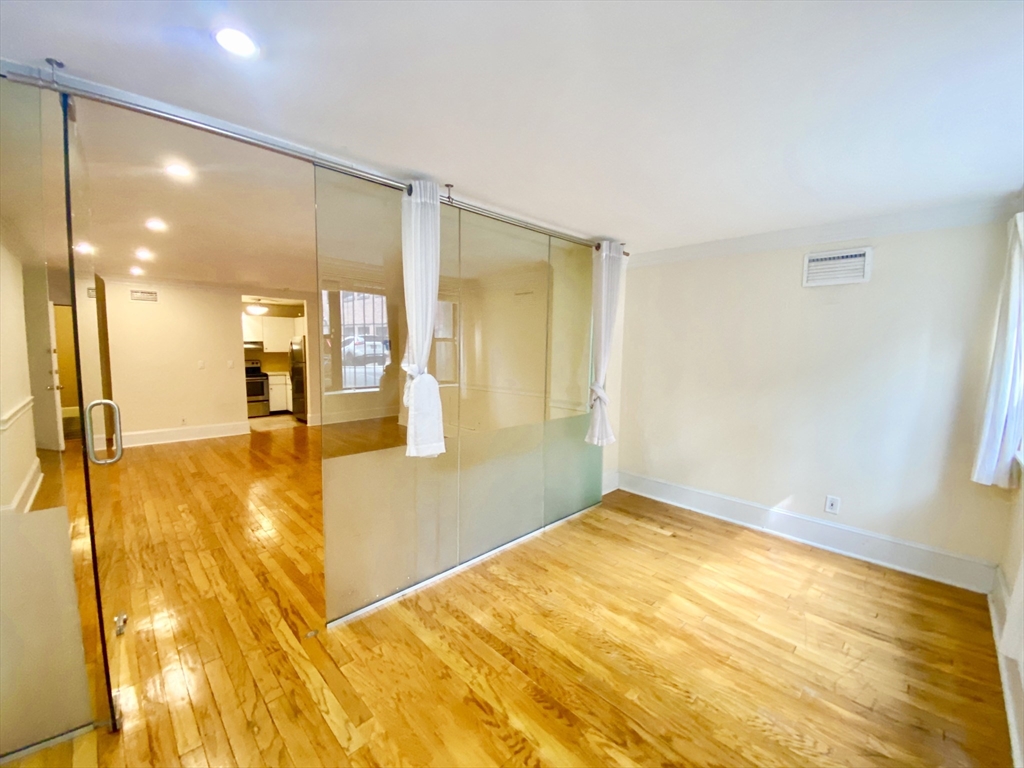 280 Commonwealth Avenue, Unit G8 Boston, MA 02116 - Photo 7 of 12 a view of livingroom and a kitchen
