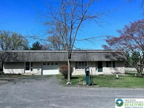 a view of a house with a patio