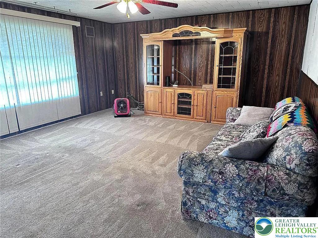3709 Fairview Street Bethlehem, PA 18017 - Photo 2 of 6 a bed sitting in a bedroom next to a window