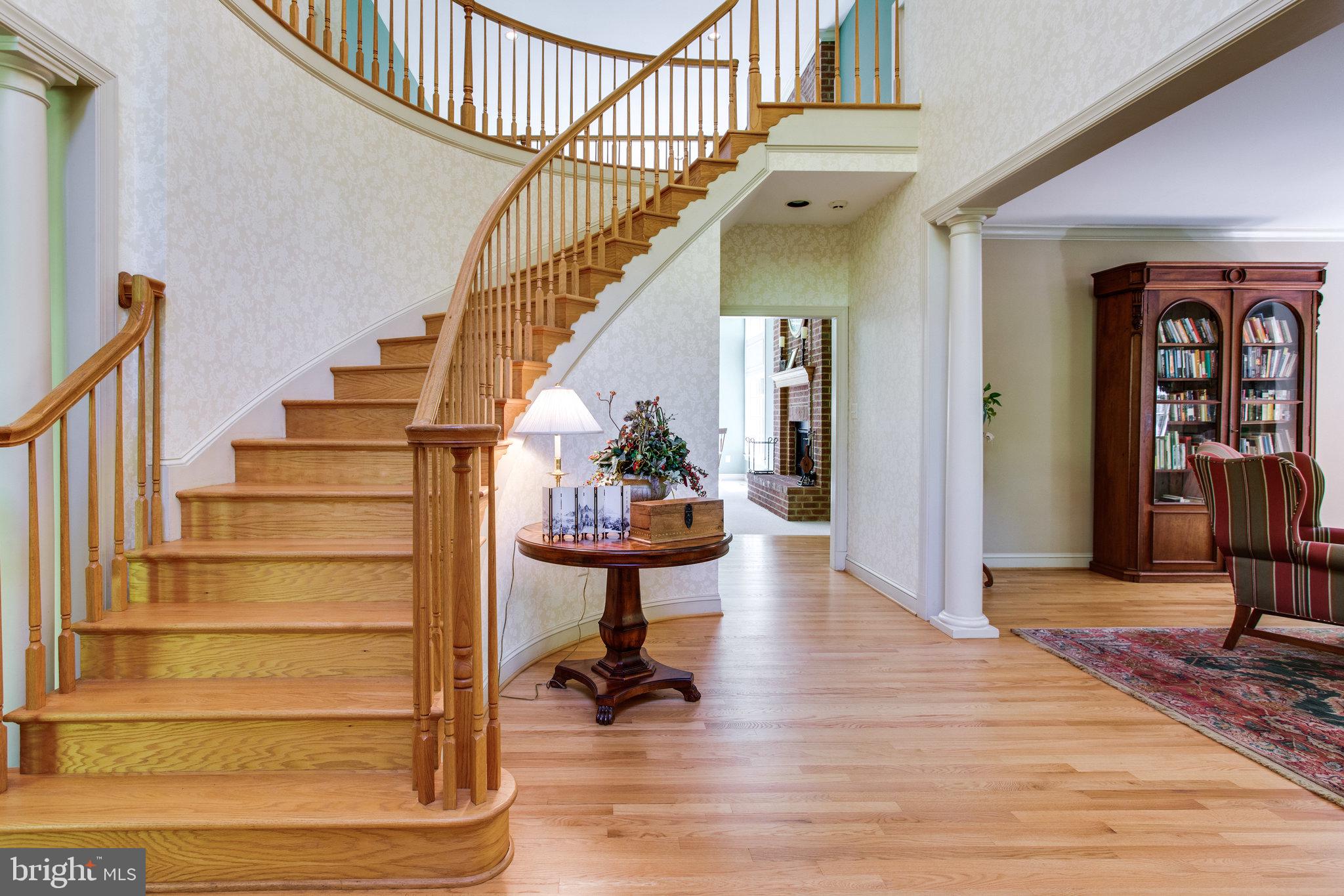 147 Yarnick Road Great Falls, VA 22066 - Photo 3 of 41 2 Story Foyer with curved staircase