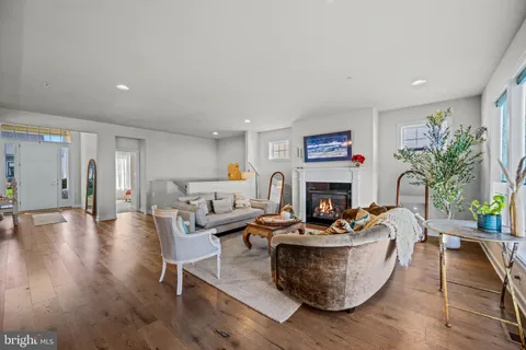 a bedroom with bed and a chandelier