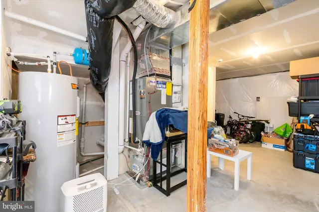 a view of a brick house with a yard next to a yard