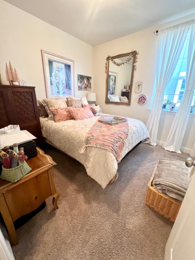 18643 McClellan Circle East Garrison, CA 93933 - Photo 17 of 42 a bedroom with bed and window