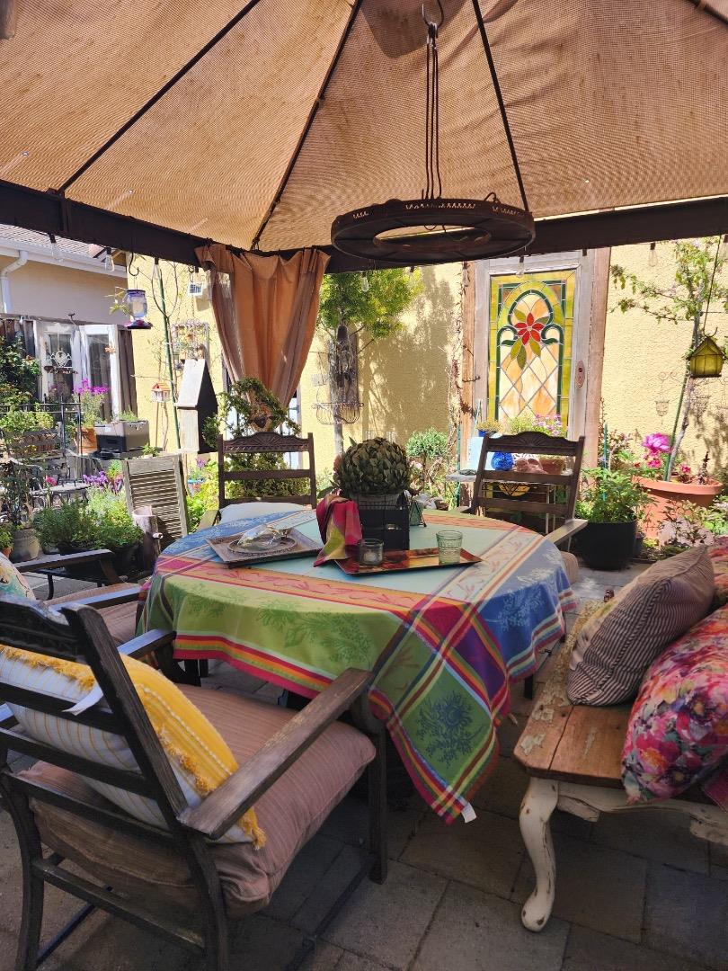 18643 McClellan Circle East Garrison, CA 93933 - Photo 19 of 42 a living room with patio furniture and a floor to ceiling window