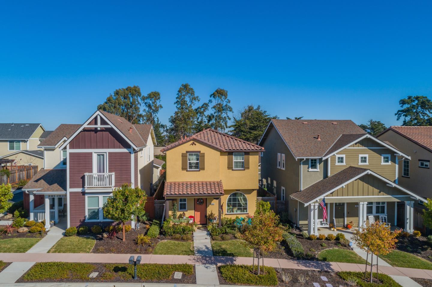 18643 McClellan Circle East Garrison, CA 93933 - Photo 2 of 42 a front view of a house with a yard