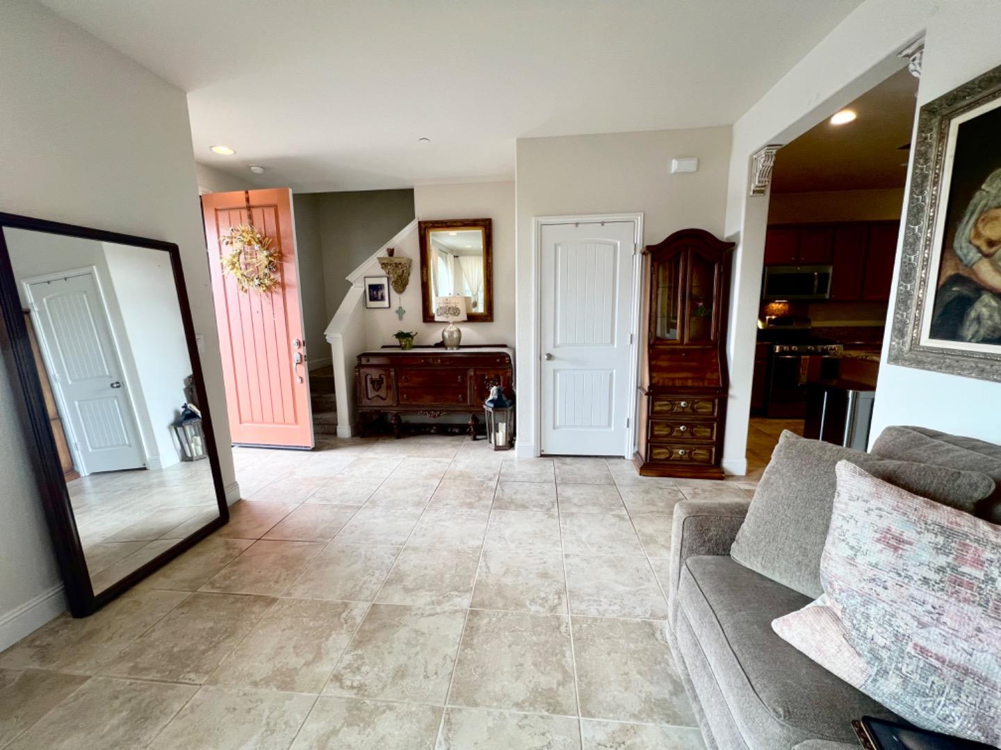 18643 McClellan Circle East Garrison, CA 93933 - Photo 42 of 42 a living room with furniture and a flat screen tv