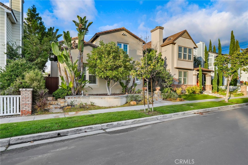 4 Sandy Pond Road Ladera Ranch, CA 92694 - Photo 1 of 1 a front view of a house with a yard and a garage
