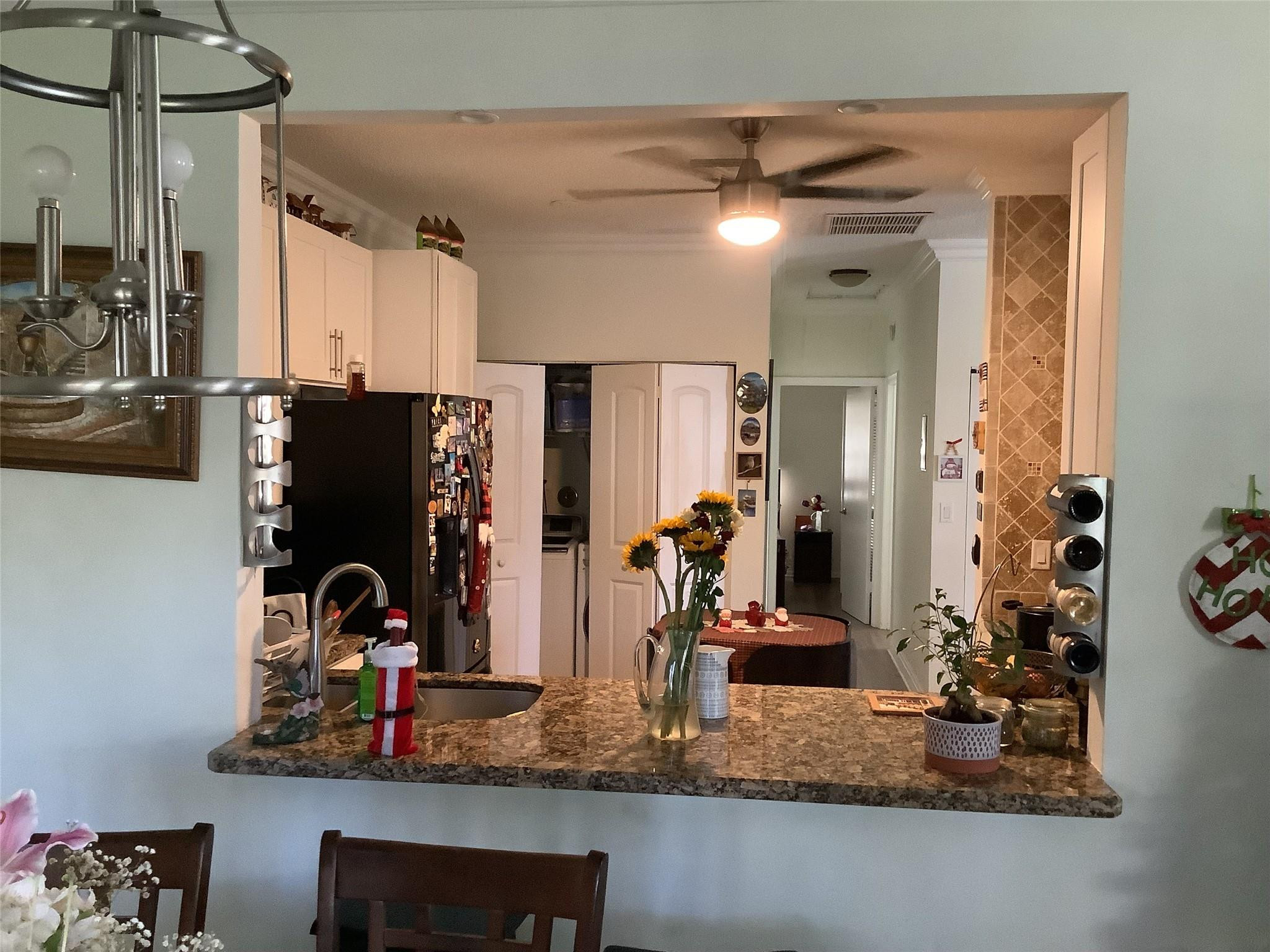 4765 South Hemingway Circle, Unit 68 Margate, FL 33063 - Photo 13 of 39 a view of a bathroom with sink and mirror