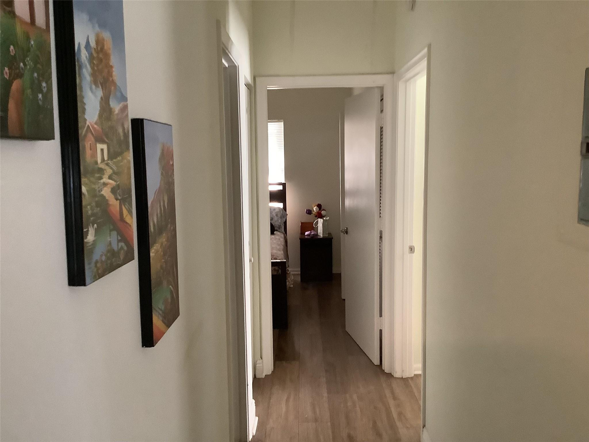 4765 South Hemingway Circle, Unit 68 Margate, FL 33063 - Photo 20 of 39 a view of a hallway with wooden floor and closet