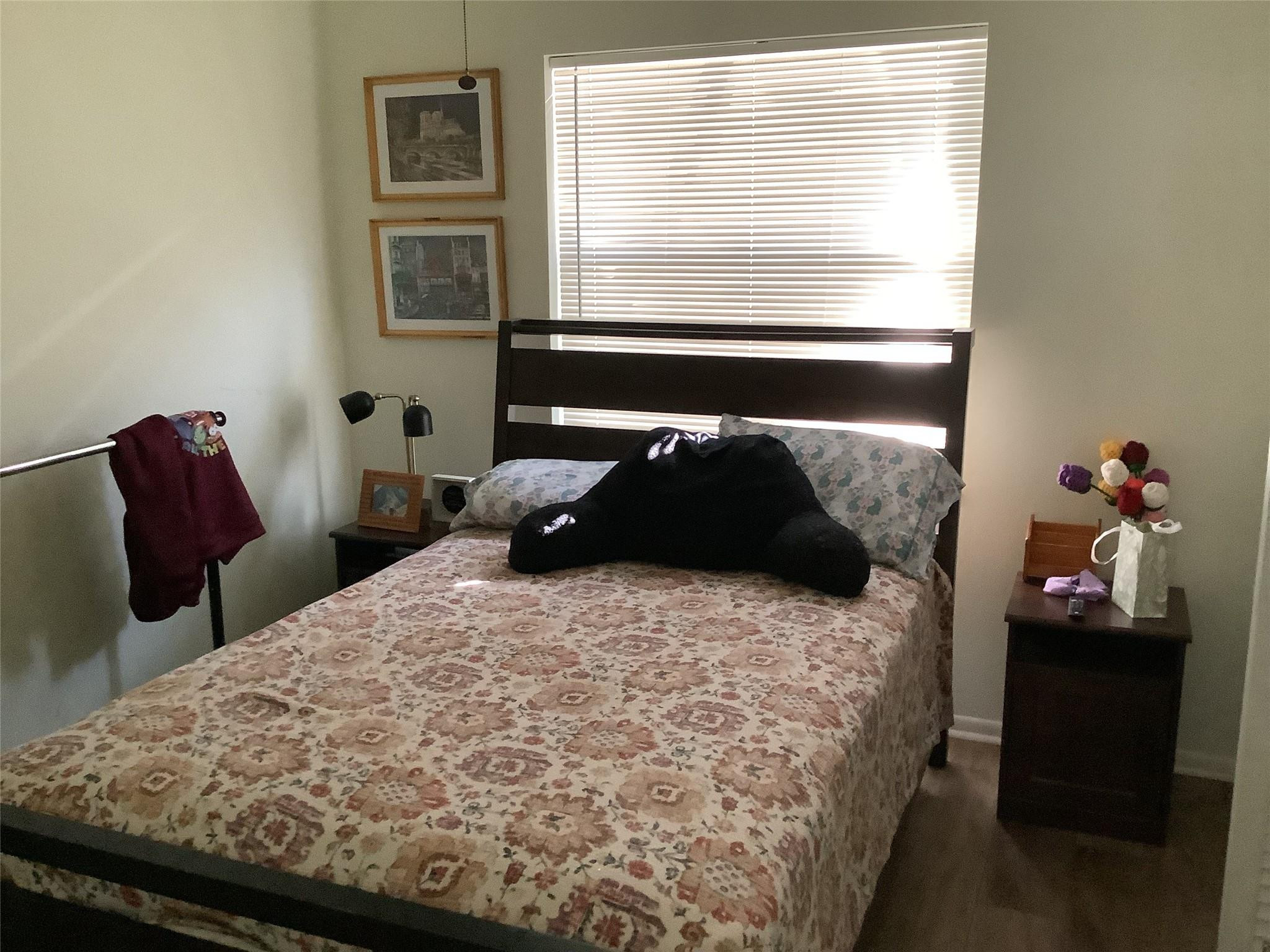 4765 South Hemingway Circle, Unit 68 Margate, FL 33063 - Photo 22 of 39 a bedroom with a bed and window