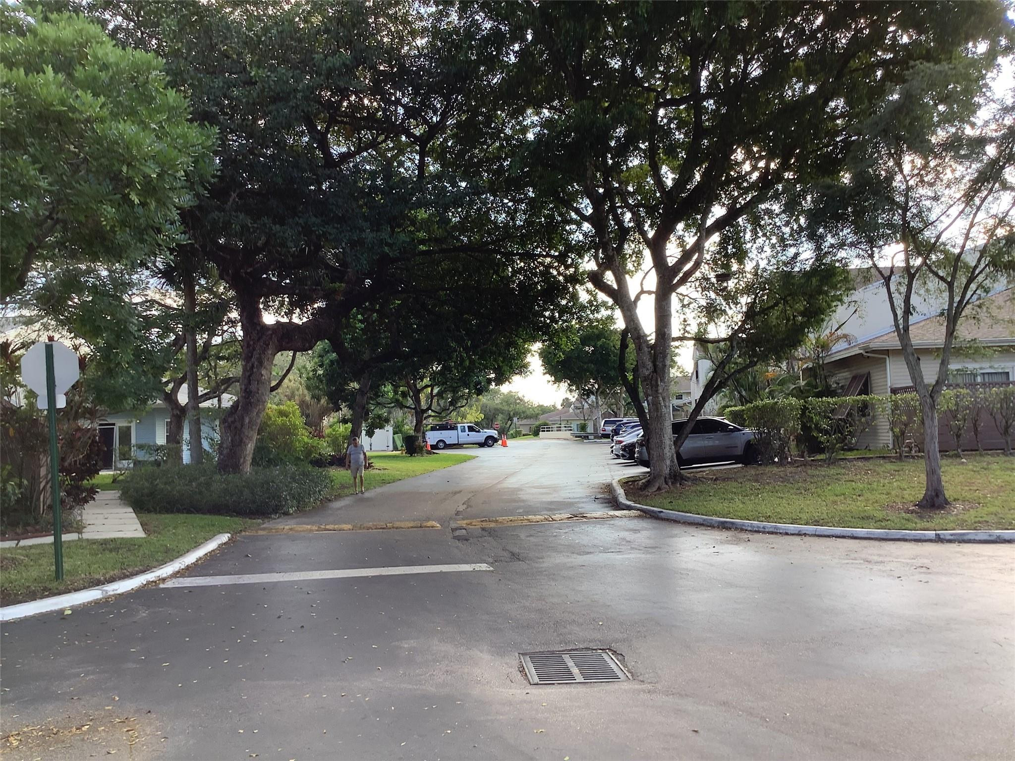 4765 South Hemingway Circle, Unit 68 Margate, FL 33063 - Photo 39 of 39 a view of a street with a large trees
