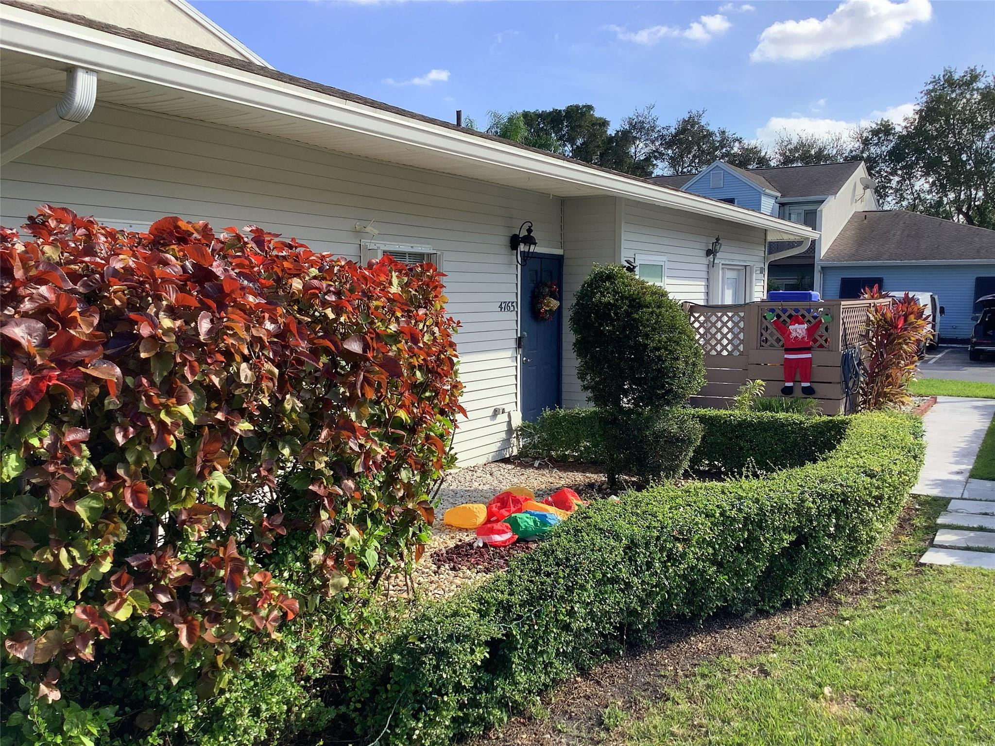 4765 South Hemingway Circle, Unit 68 Margate, FL 33063 - Photo 7 of 39 a front view of a house with a yard