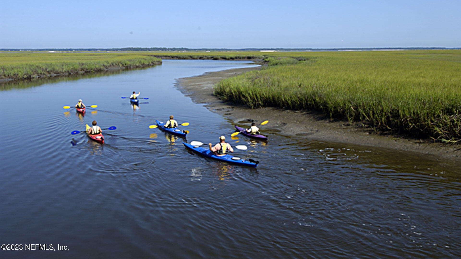 86624 Shortline Circle Yulee, FL 32097 - Photo 29 of 31 a view of a lake with a sitting space