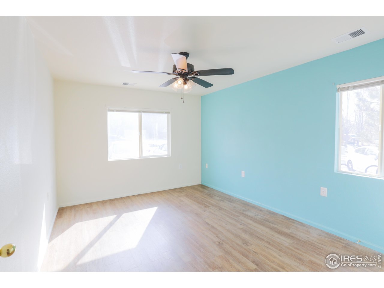 6827 Autumn Ridge Drive, Unit 4 Fort Collins, CO 80525 - Photo 20 of 28 a view of an empty room with a window