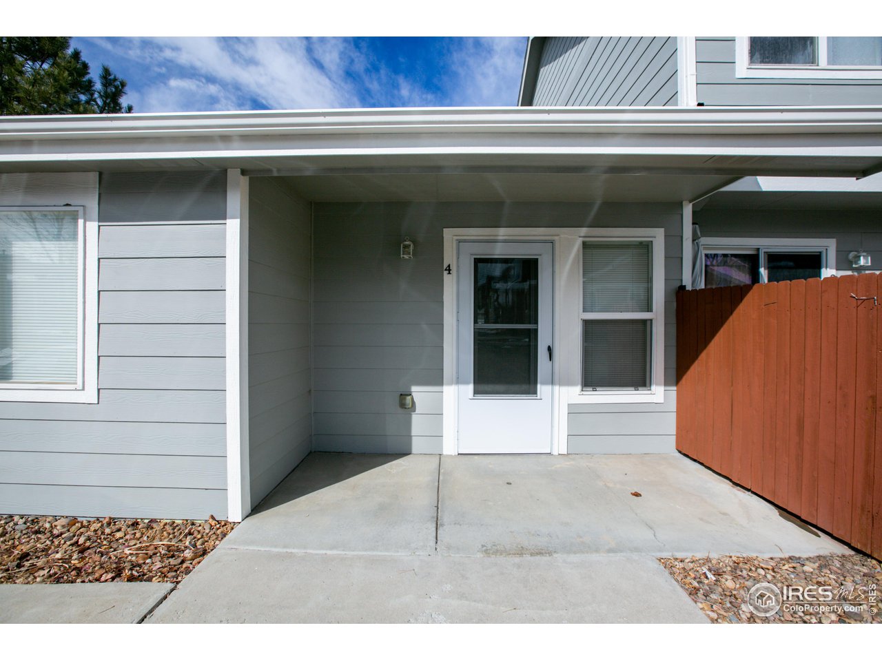 6827 Autumn Ridge Drive, Unit 4 Fort Collins, CO 80525 - Photo 26 of 28 a view of entryway with a front door