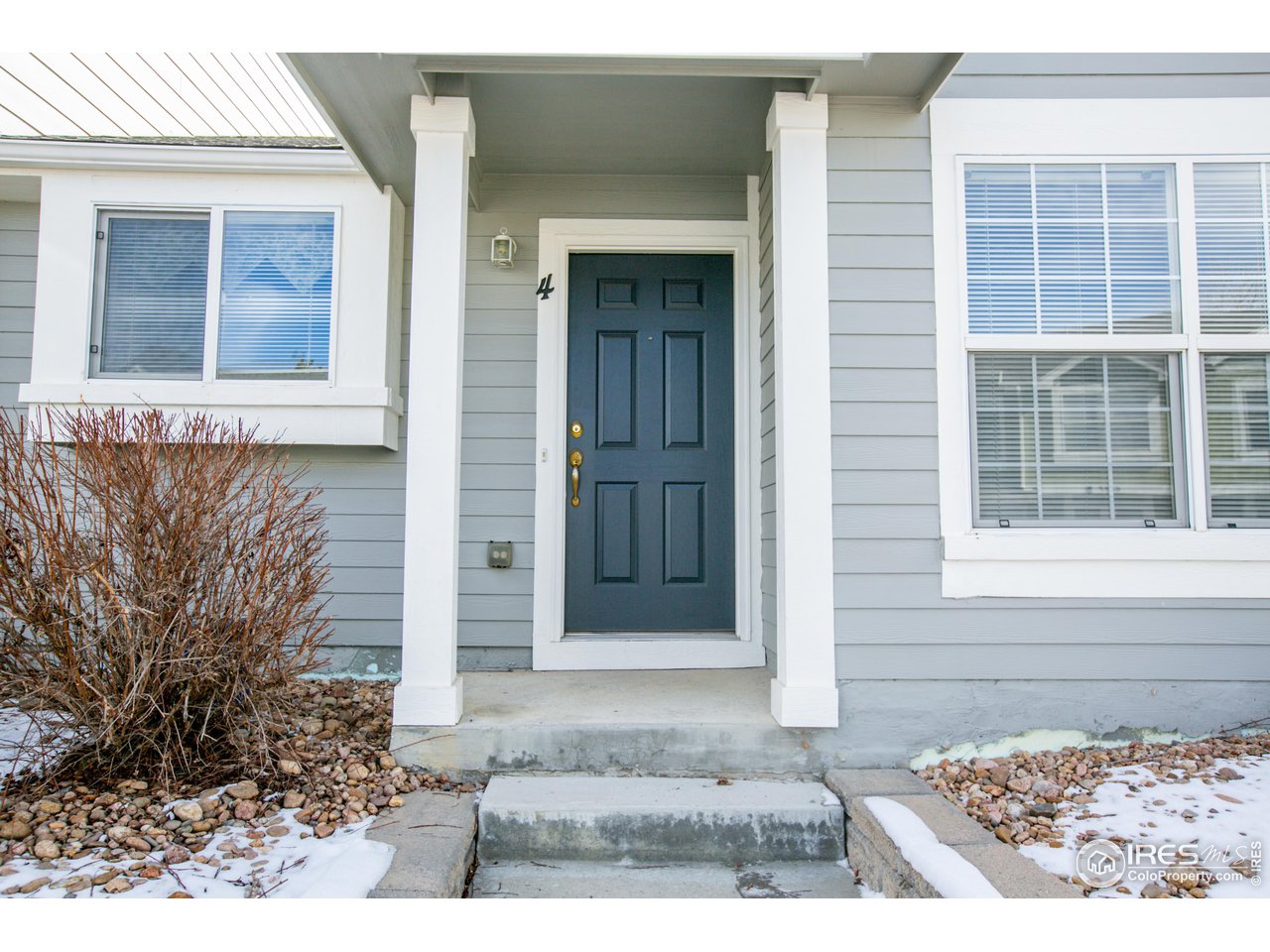 6827 Autumn Ridge Drive, Unit 4 Fort Collins, CO 80525 - Photo 4 of 28 a front view of a house
