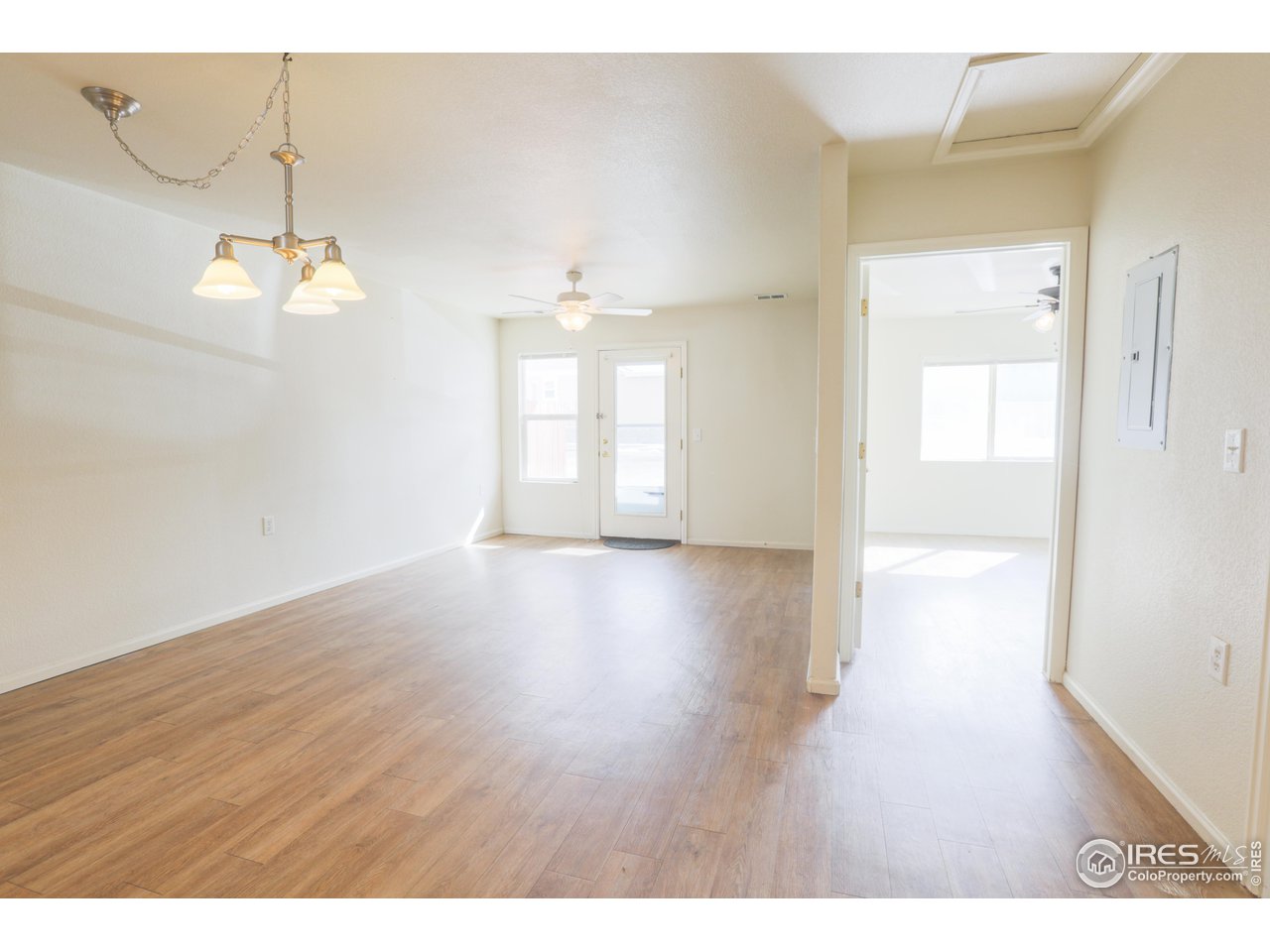 6827 Autumn Ridge Drive, Unit 4 Fort Collins, CO 80525 - Photo 5 of 28 a view of a room with wooden floor