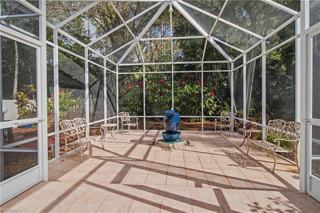 5186 Tallowood Way Naples, FL 34116 - Photo 43 of 50 a view of a dinning table and chairs in the patio