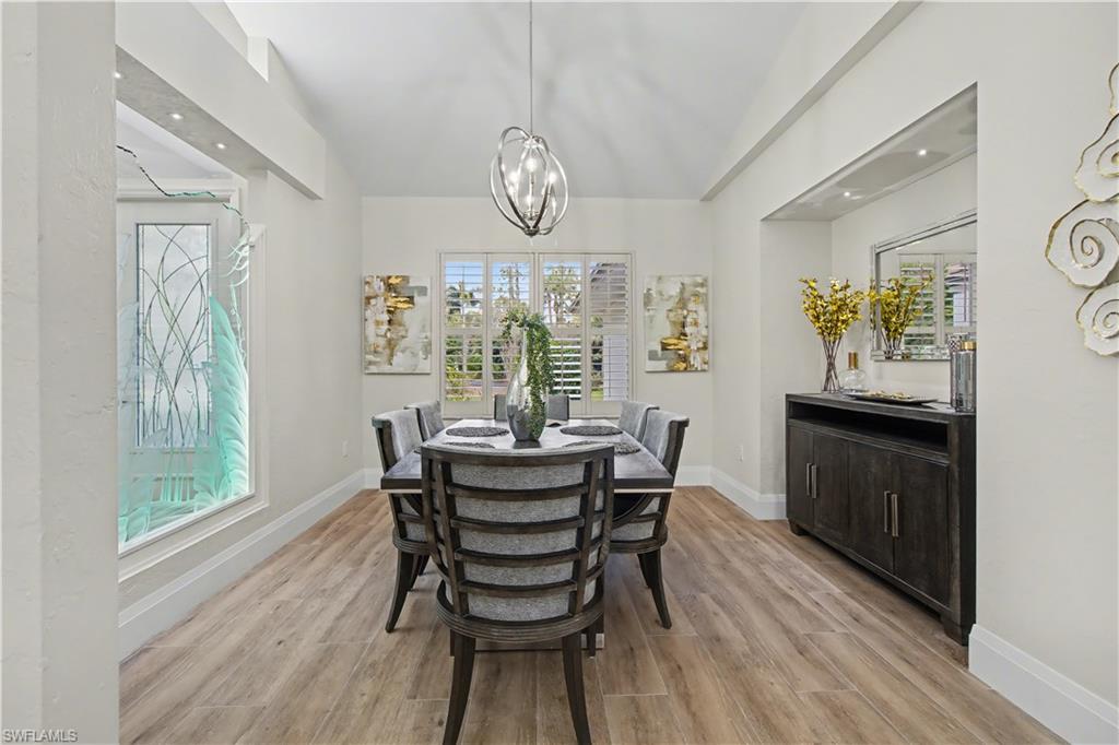 5186 Tallowood Way Naples, FL 34116 - Photo 10 of 50 a dining room with furniture and window