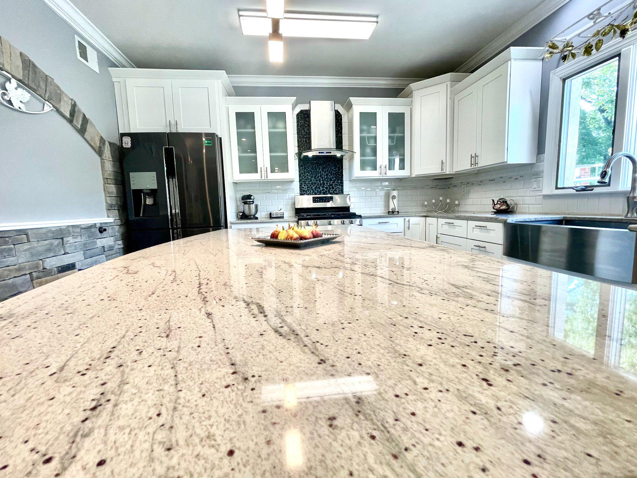 1830 Buck Road Feasterville-Trevose, PA 19053 - Photo 12 of 48 a kitchen with a stove a refrigerator and a sink