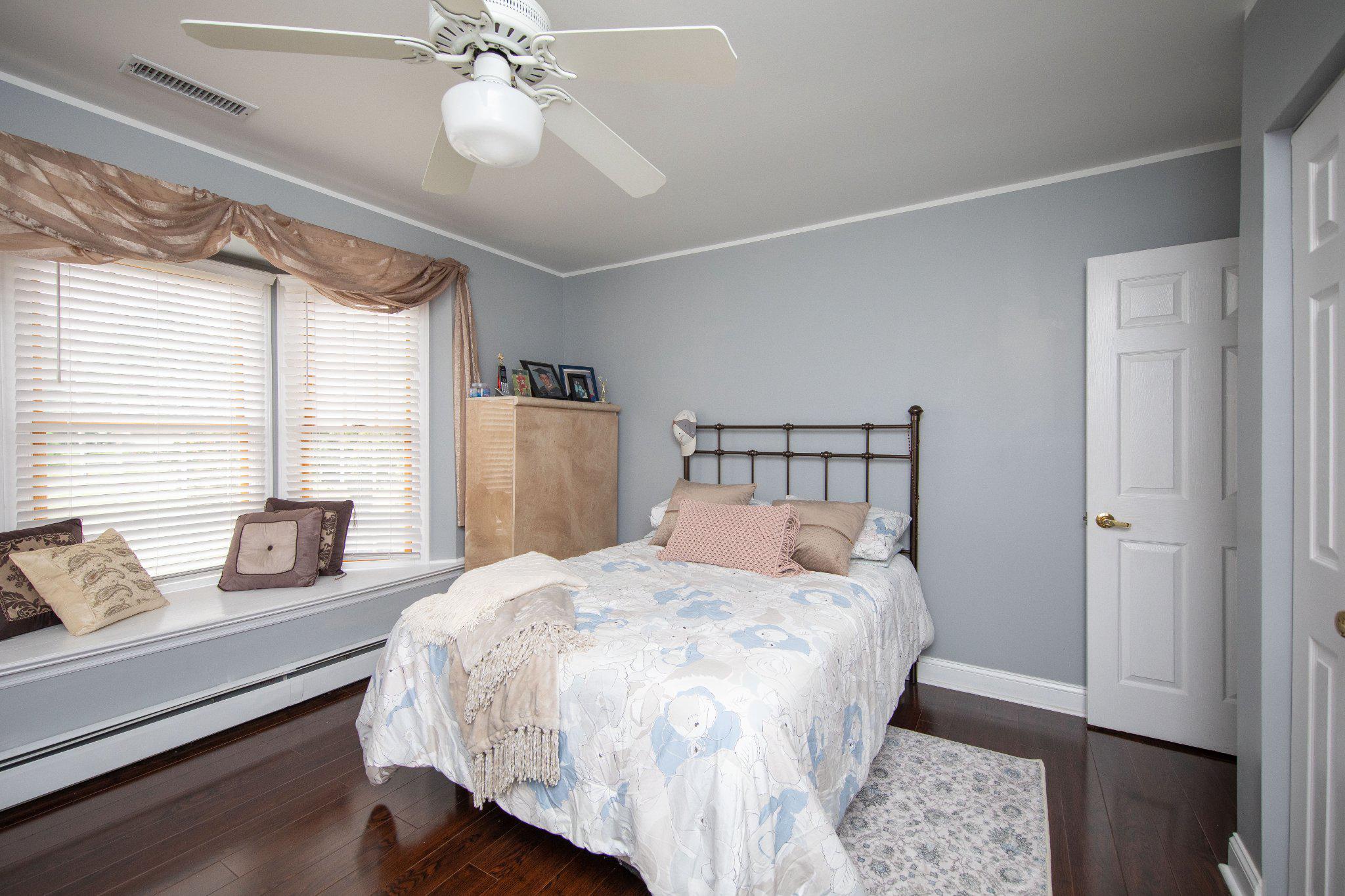 1830 Buck Road Feasterville-Trevose, PA 19053 - Photo 32 of 48 a bedroom with a bed and window