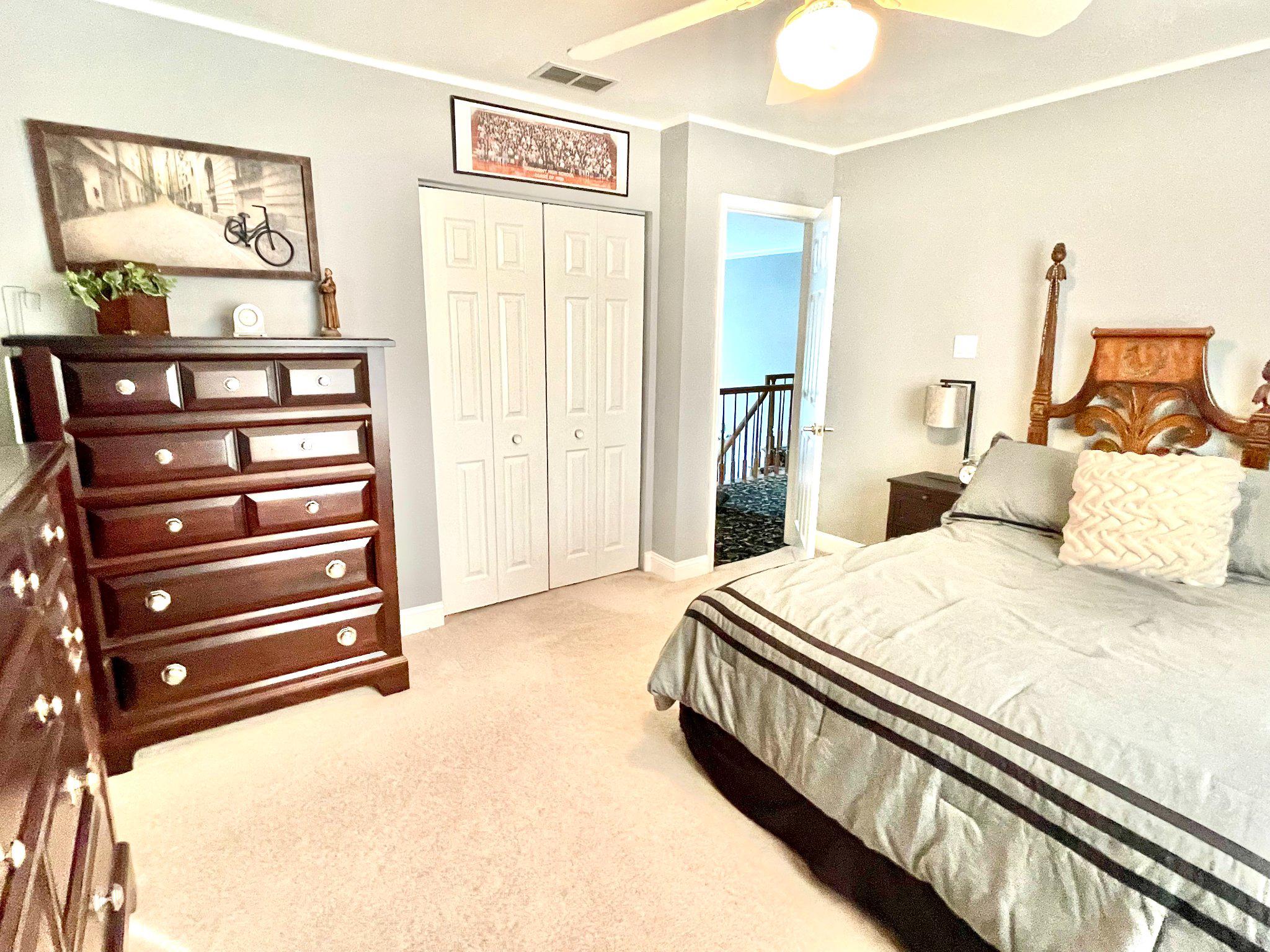 1830 Buck Road Feasterville-Trevose, PA 19053 - Photo 33 of 48 a bedroom with a bed and a chandelier