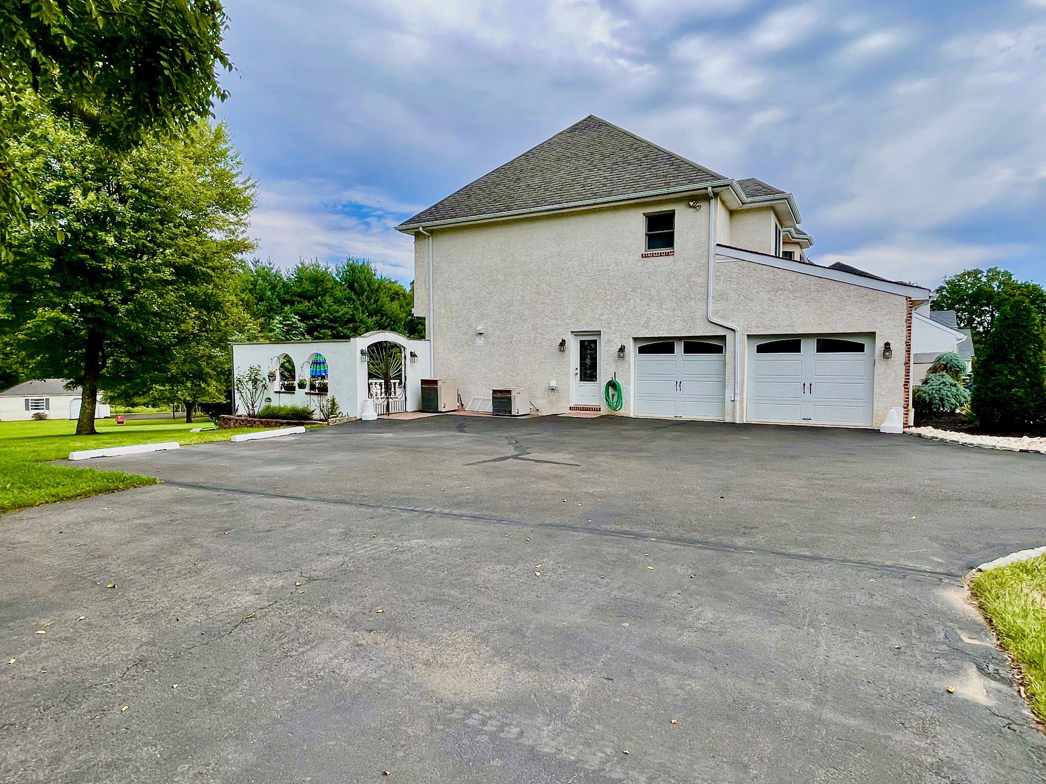 1830 Buck Road Feasterville-Trevose, PA 19053 - Photo 45 of 48 a view of a house with a yard