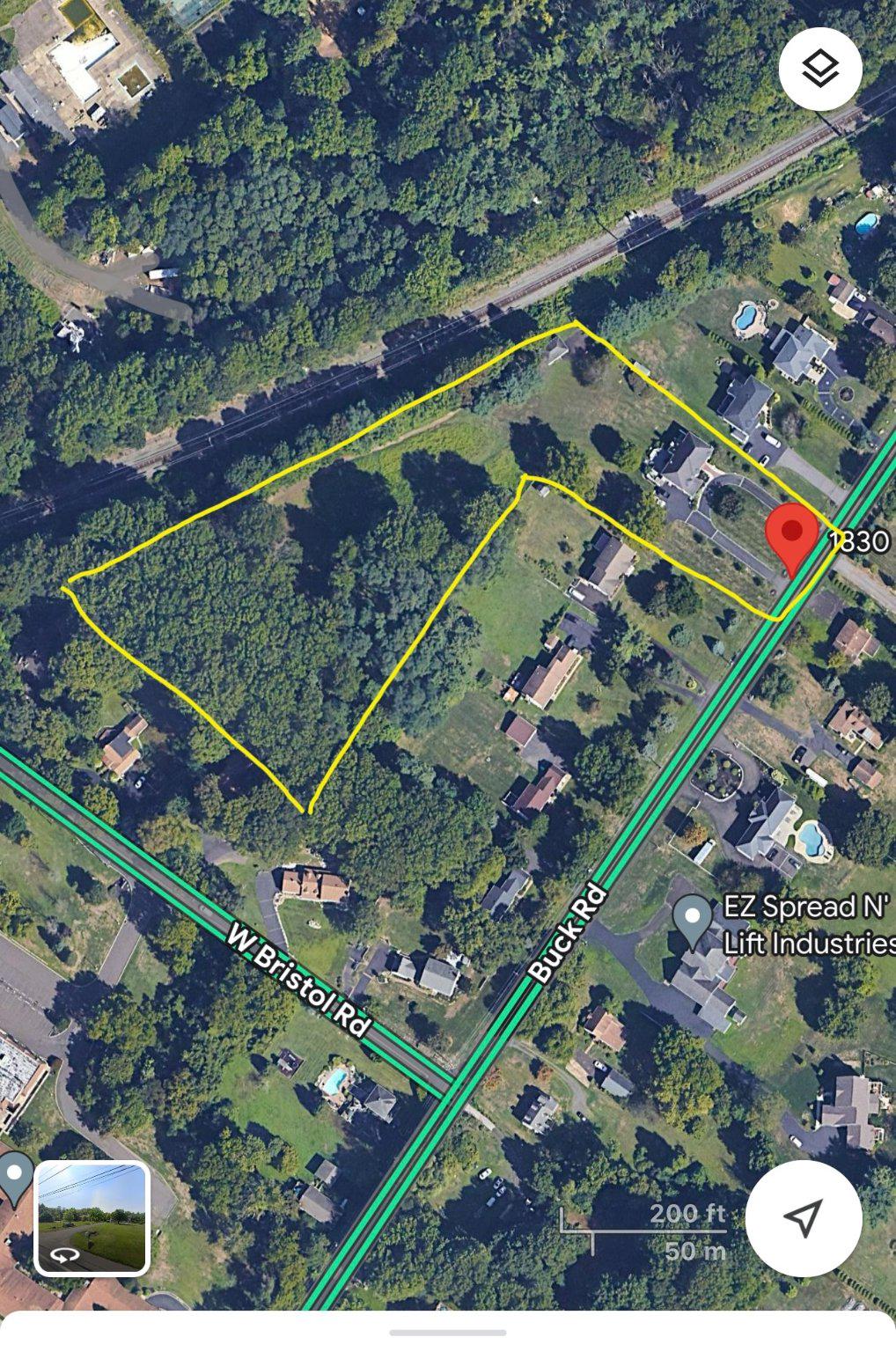 1830 Buck Road Feasterville-Trevose, PA 19053 - Photo 47 of 48 an aerial view of a tennis ground and a cars park side of the road