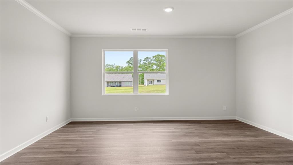 6012 Muirfield Point Union City, GA 30213 - Photo 15 of 37 a view of an empty room with wooden floor and a window