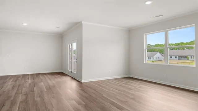 an empty room with windows