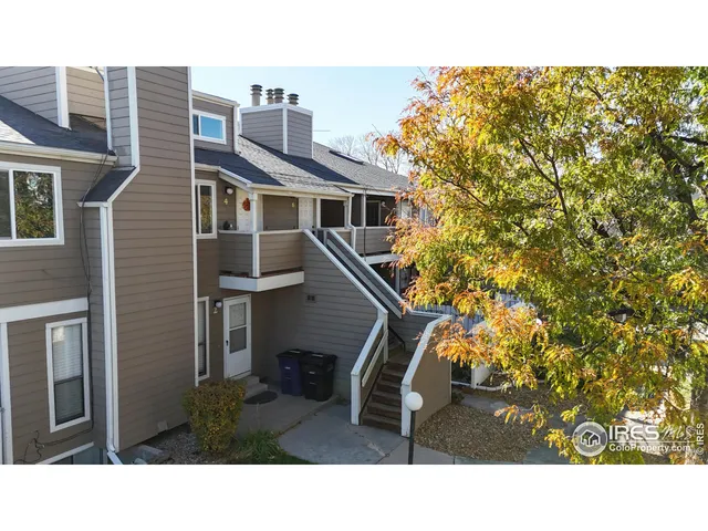 a terrace of a house with outdoor seating