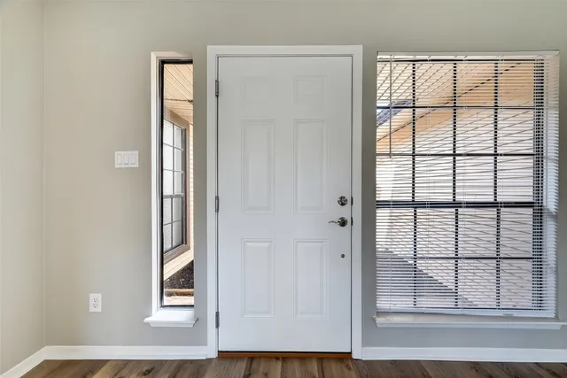 an empty room with windows