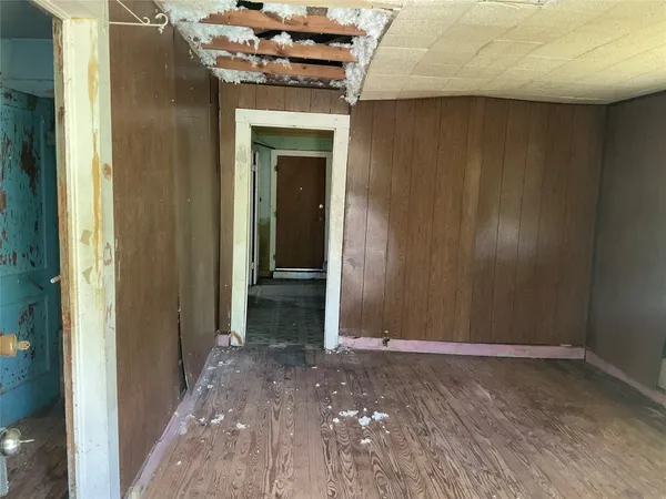 a view of a bathroom from a hallway