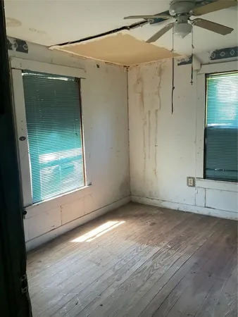 a view of a hallway with a wooden shelves