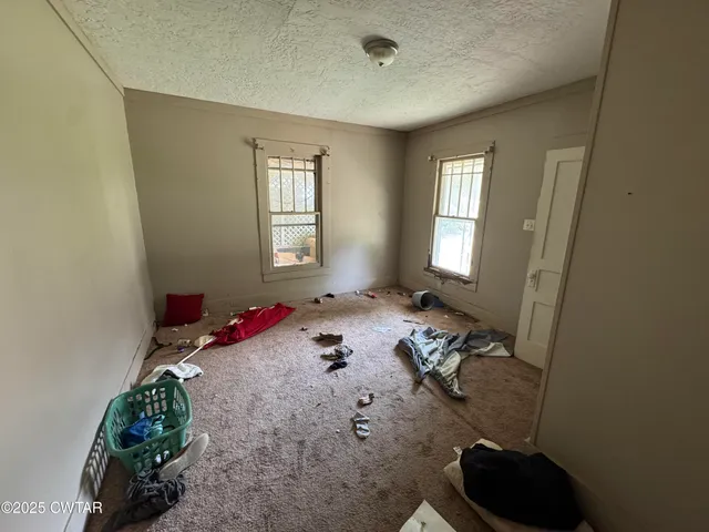 a room with furniture and a window