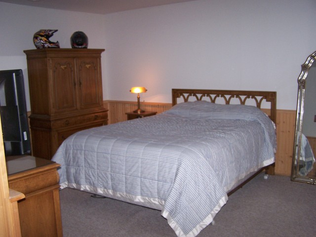 3568 East 28th Road Seneca, IL 61360 - Photo 14 of 19 a bedroom with a bed and a closet