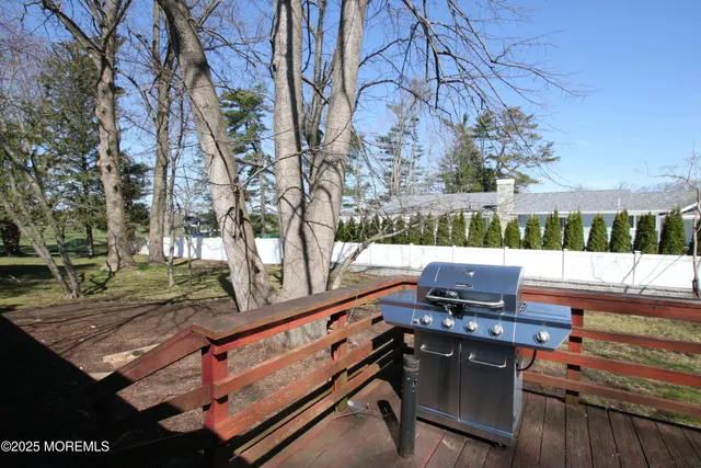a view of a bench in a backyard