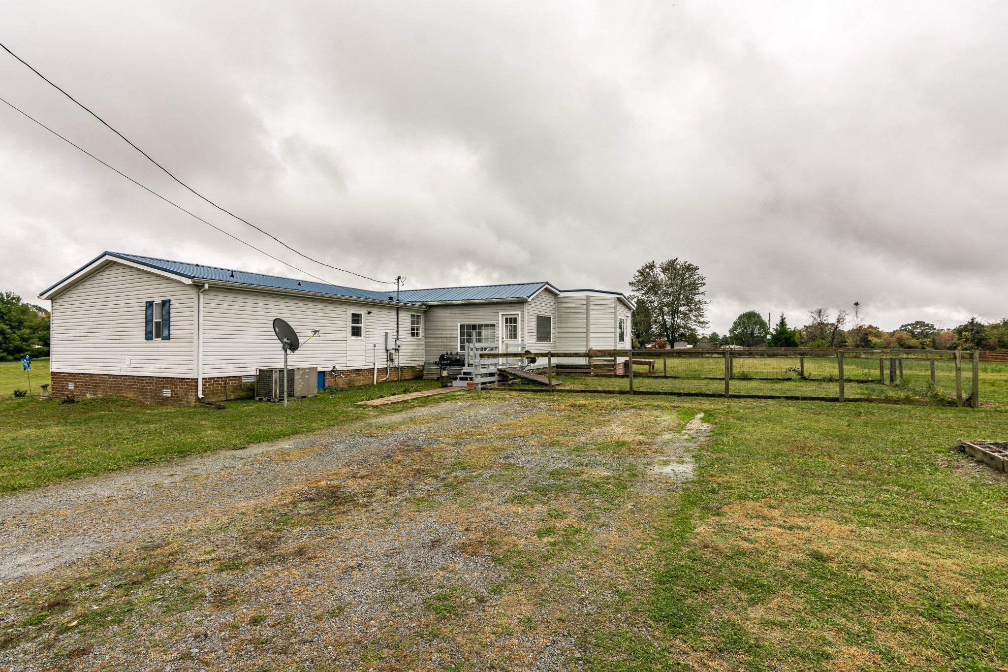 128 East Biggs Road Portland, TN 37148 - Photo 33 of 43 a view of a house with a big yard