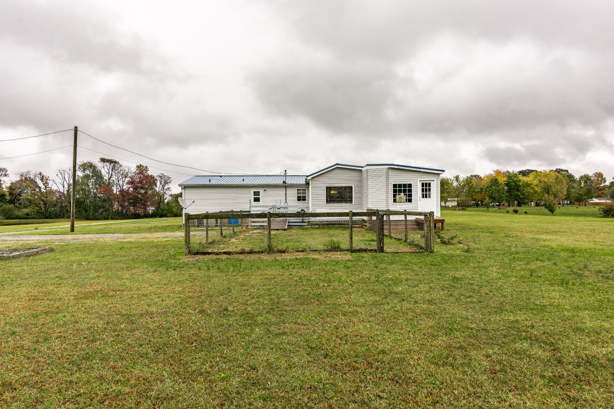128 East Biggs Road Portland, TN 37148 - Photo 43 of 43 a swimming pool with trees in the background